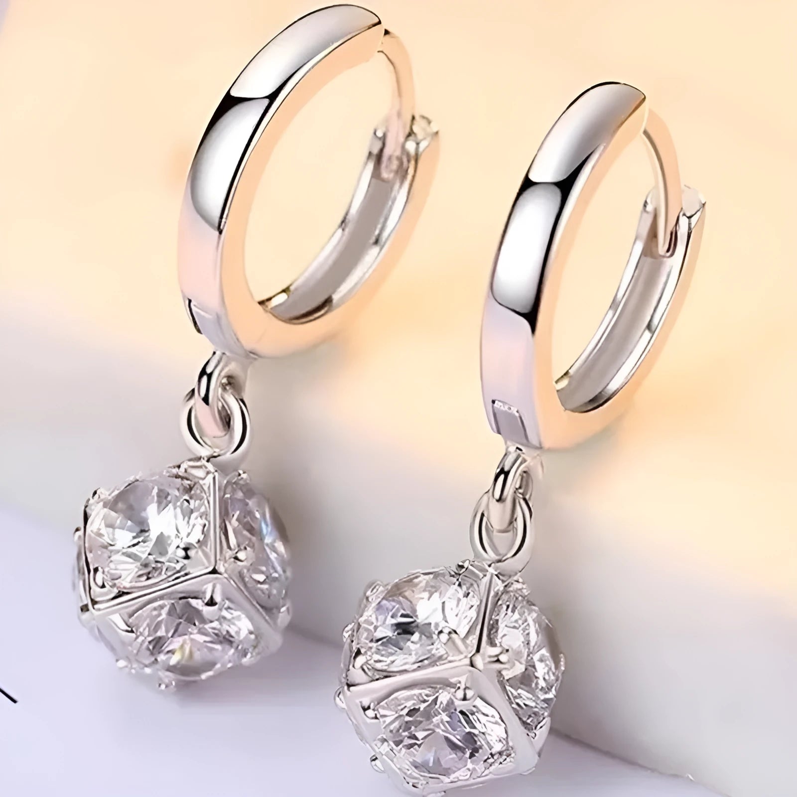 Women's geometric copper earrings with zircon and rose design elements in various colours