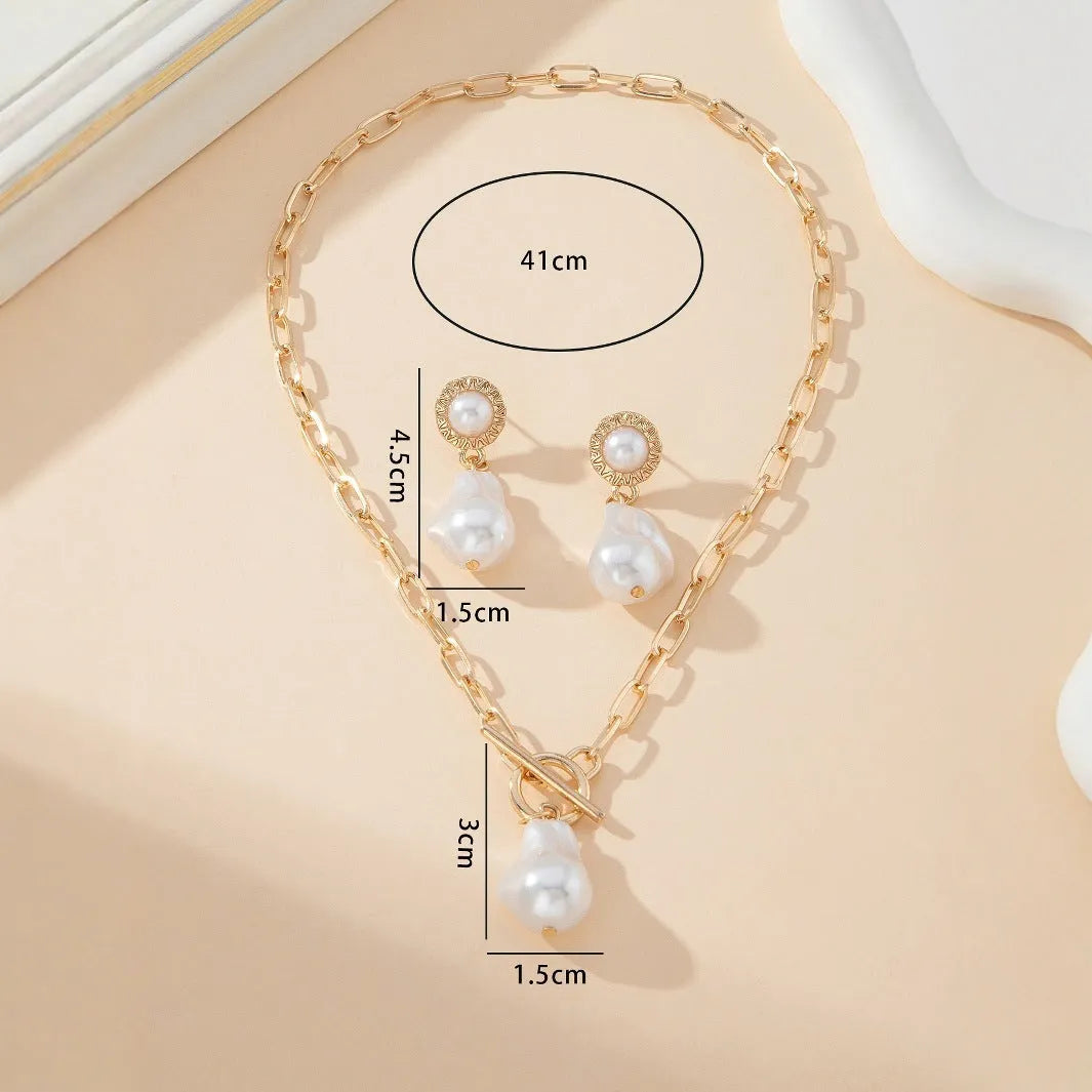 Gold-coloured baroque pearl necklace and earrings two-piece jewellery set