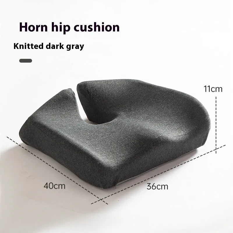 Memory foam office seat cushion in grey on a chair, showing its 36x40cm rectangular shape.