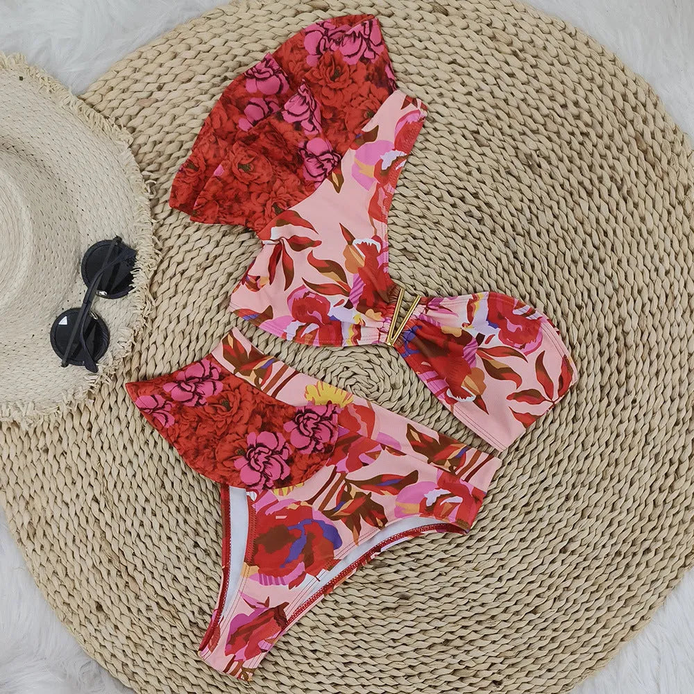 Women's pink one-shoulder ruffled swimsuit with red flowers and high-waist bikini briefs