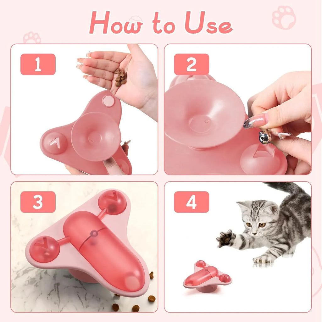 Blue interactive pet puzzle toy with airplane cabin, bell, and catnip compartment on a suction cup base.