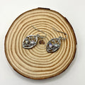 Silver-toned leaf-shaped earrings with embedded colourful moonstones for women