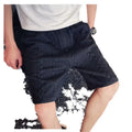 W120 Black loose straight-leg casual sports pants on model showing cotton blend fabric