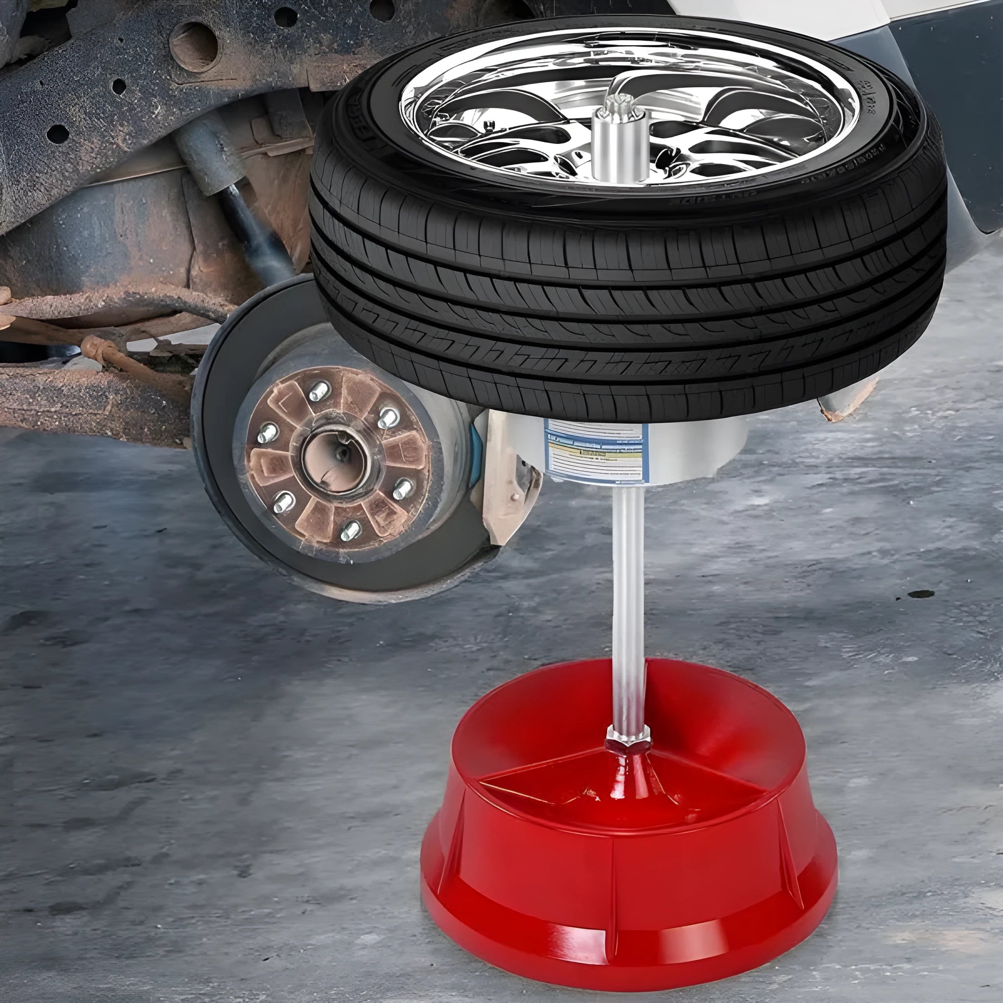 Portable aluminium head hub balancer for car and truck tyres with bull's eye level on a black enamel base.