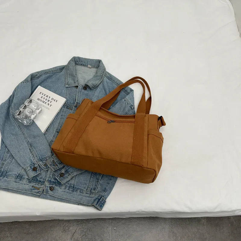 Large capacity shoulder canvas tote bag in solid colour with sandwich pocket and mobile phone compartment