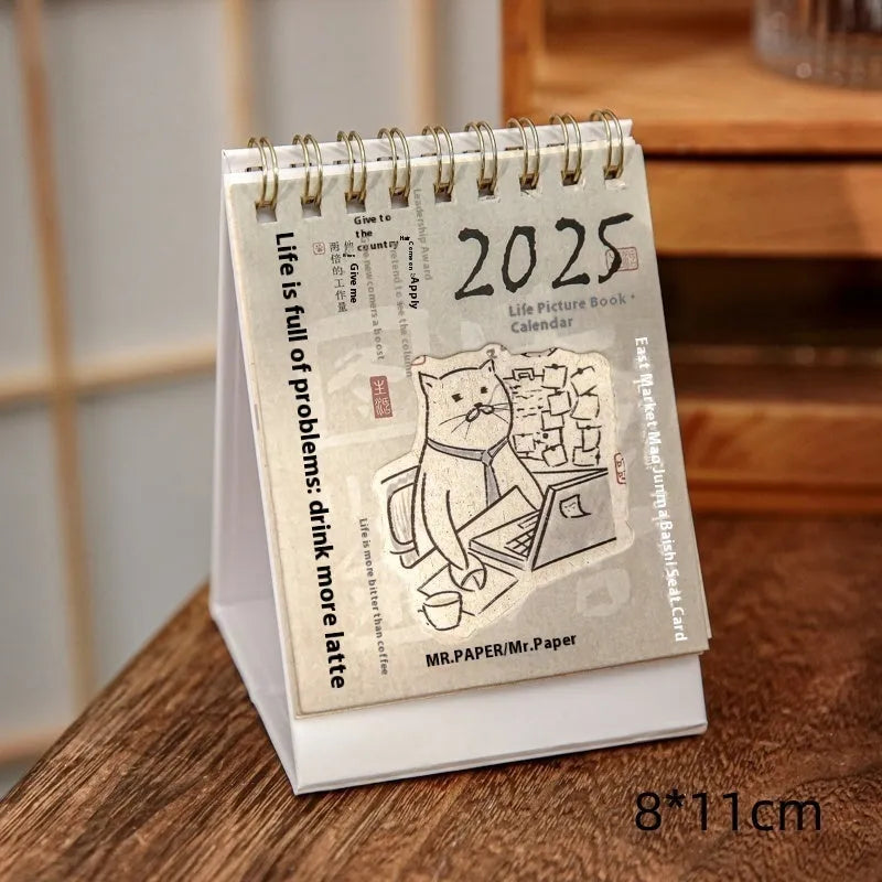 Coffee themed mini desk calendar 2025 with ten different daily designs including Coffee Time and Life Is Not Easy