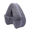 Heart-shaped dark blue memory foam leg pillow for adult knee or ankle support.