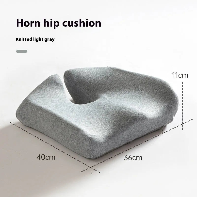 Memory foam office seat cushion in grey on a chair, showing its 36x40cm rectangular shape.