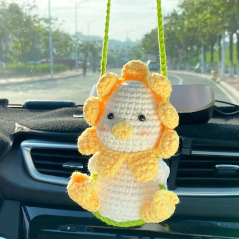 Green and white knitted rope car plant ornament with 8cm base and hanging rope.