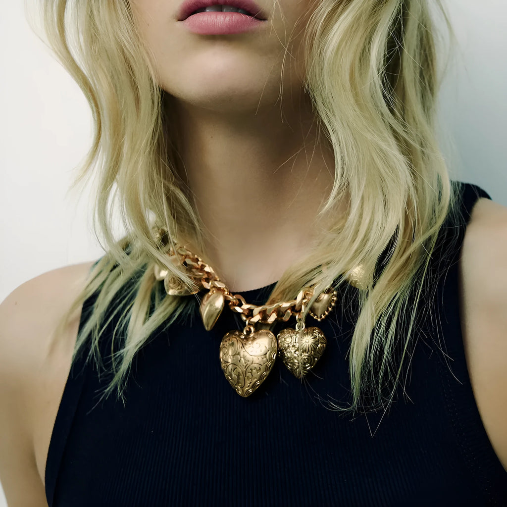 Women's exaggerated carved heart pendant necklace with dripping oil finish in gold and white K colours