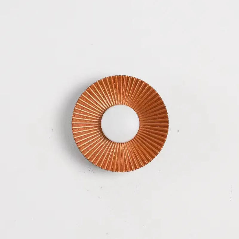 Round aluminium wall lamp with white and gold colour combinations for bedroom or living room