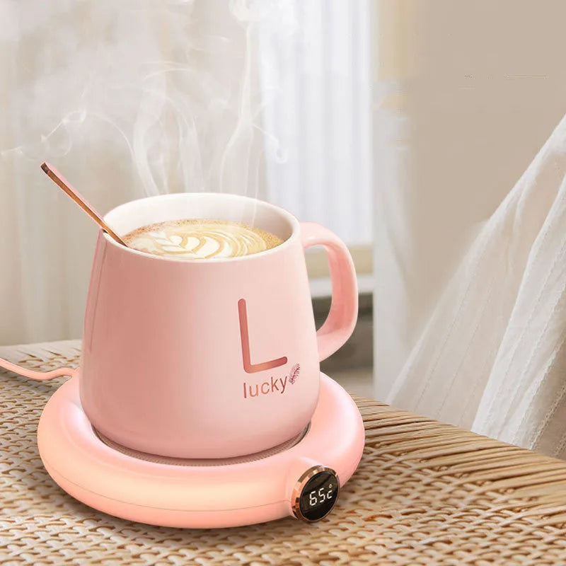 USB coffee mug warmer coaster in white on a desk, with a mug of coffee on top, 130x110x23mm, 10W constant temperature heating pad