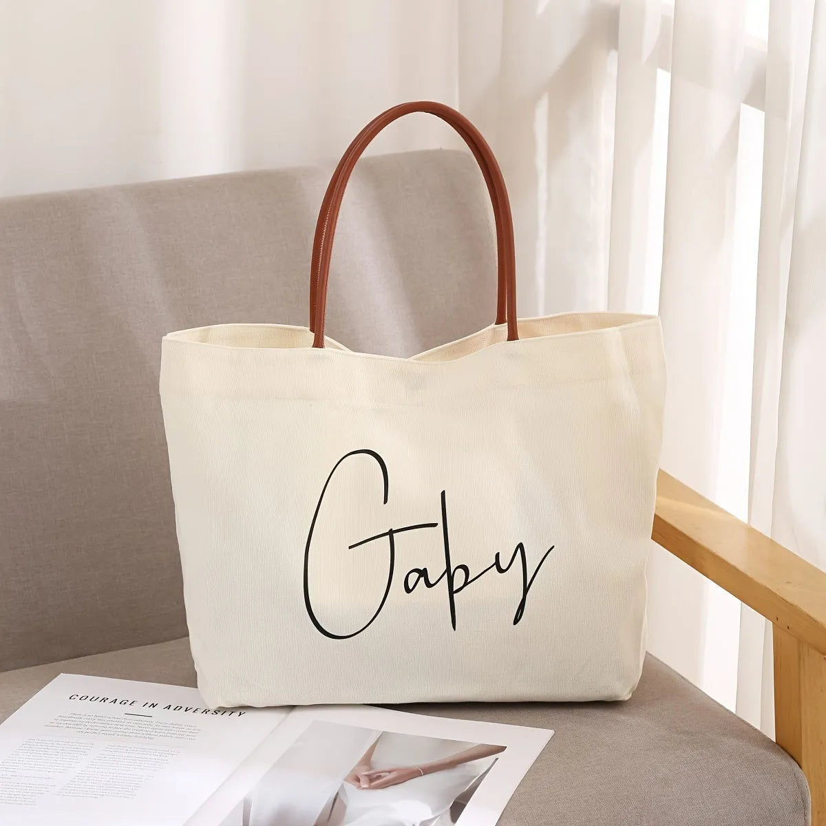 Large natural cotton canvas tote bag with wide straps, shown in beige white colour.