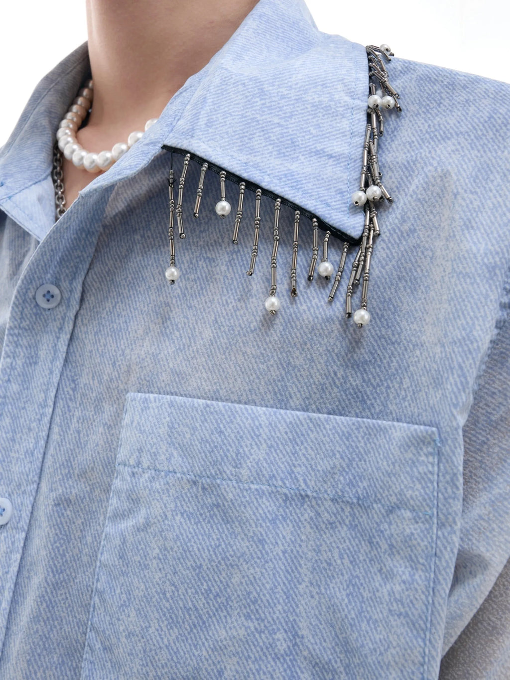 Man wearing a blue and white gradient loose fit short sleeve polyester summer shirt