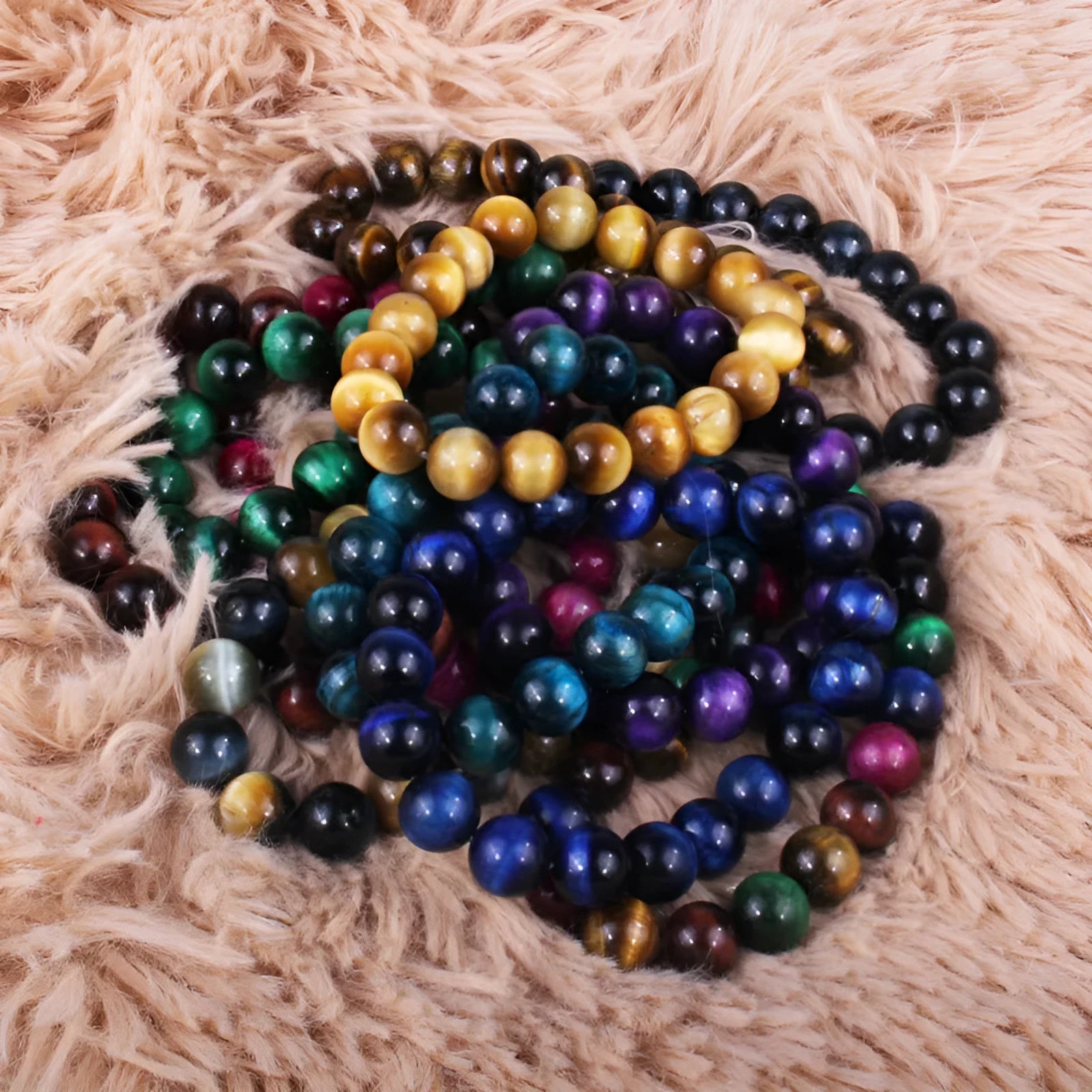 Natural tigereye crystal bead bracelet with round beads in a choice of colours and sizes.