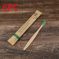Set of 10 colourful bamboo toothbrushes with black charcoal bristles on a white background.