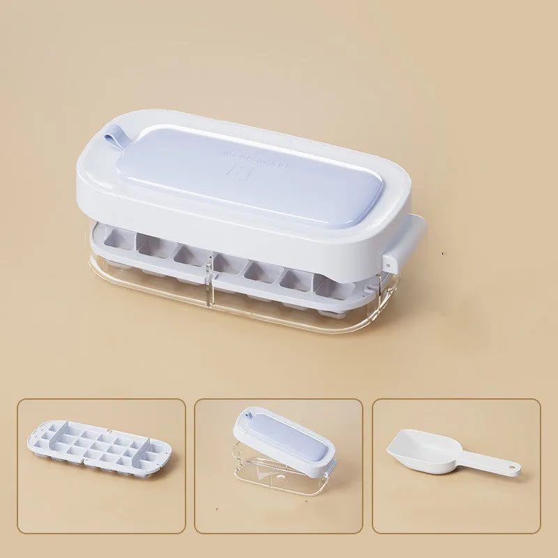 High-capacity plastic ice cube tray with grid pattern and ice shovel, shown in blue colour.