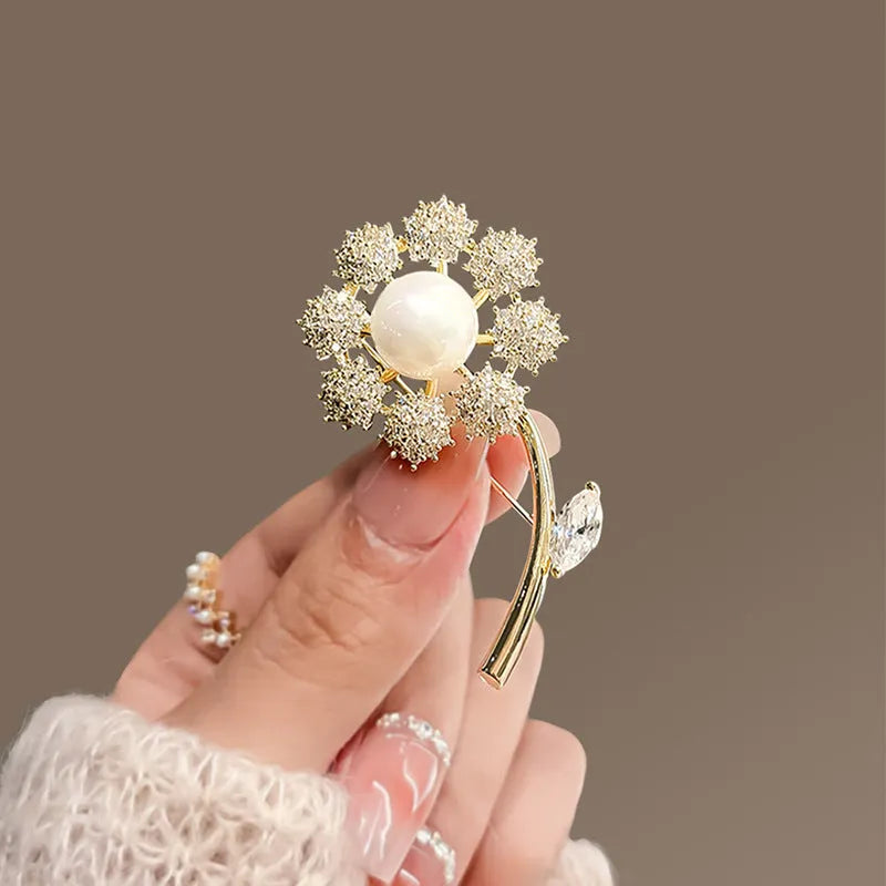 Alloy brooch in natural flower shape with electroplated finish, featuring adjustable and anti-exposure pin closure for women's coats and suits.