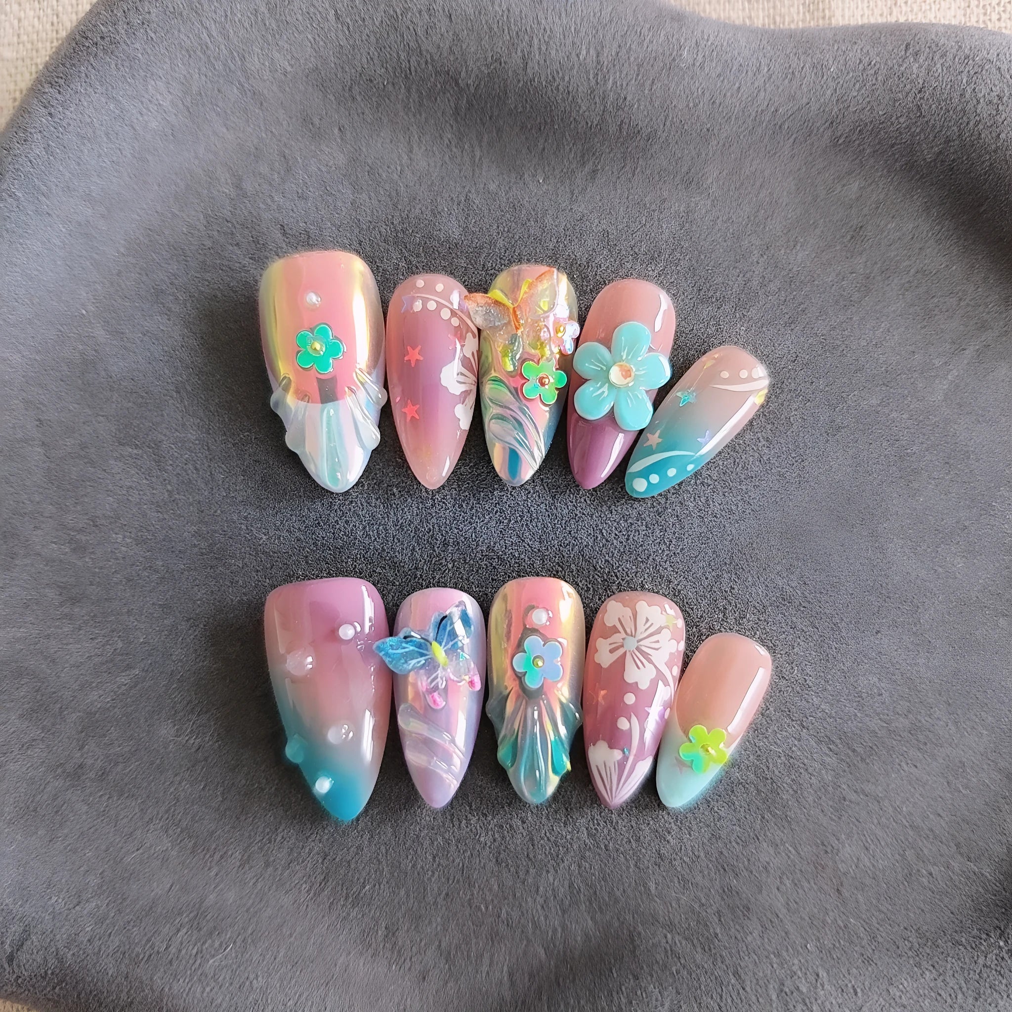 Handmade colourful butterfly wear manicure sculpture with floral patterns and embossed details