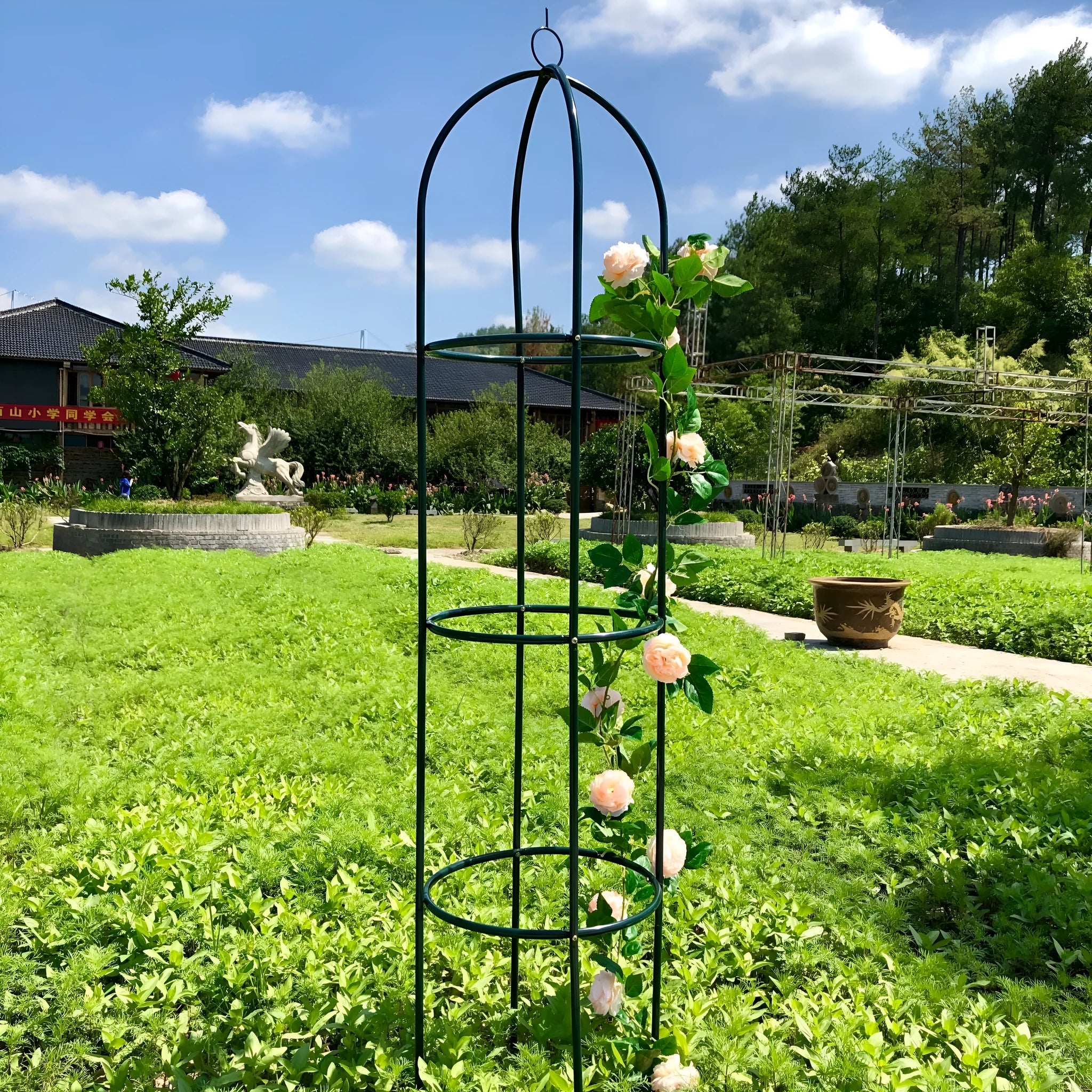 Dark green wrought iron plant climbing frame lattice, 188 cm tall by 40 cm wide.
