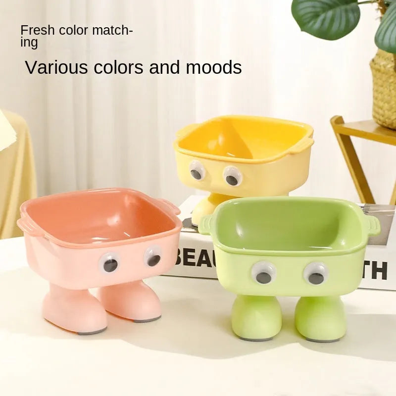 Green robot design elevated pet bowl with tilted feeding surface and detachable inner bowl