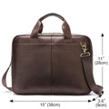 Black cowhide leather one shoulder computer handbag with sewing thread detail on a white background
