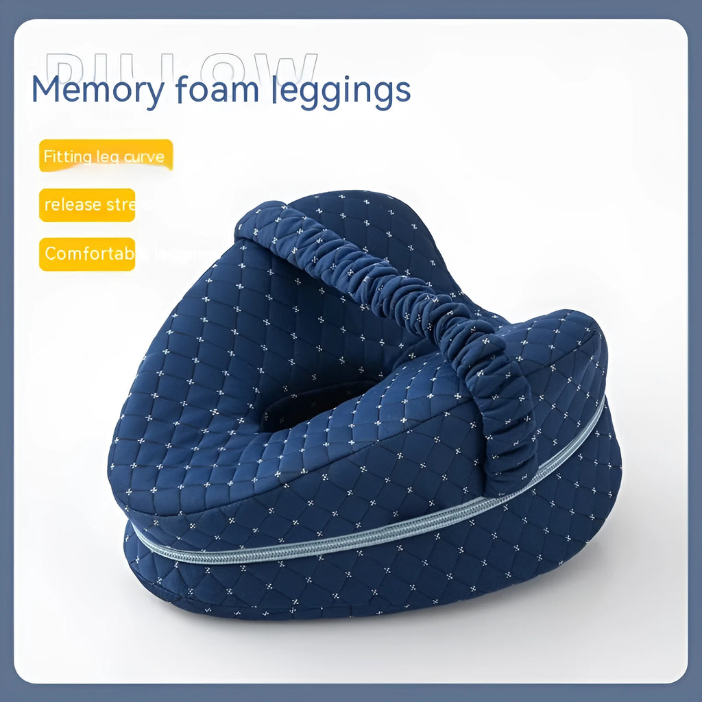 Heart-shaped dark blue memory foam leg pillow for adult knee or ankle support.