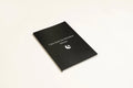 Black Dream Journal notebook with a business simplicity design for recording dreams and notes.