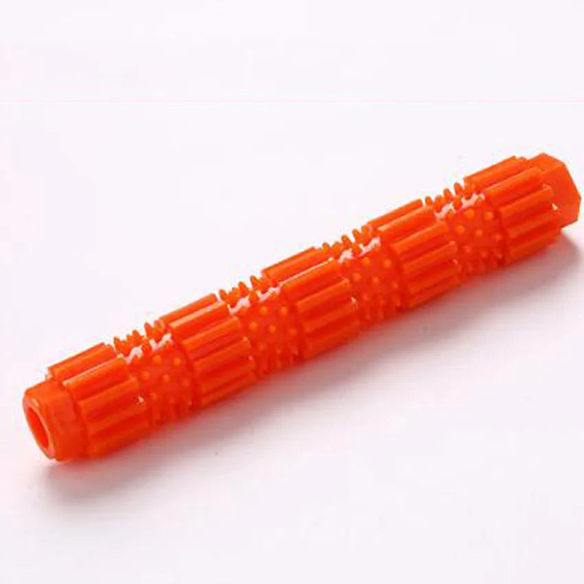 Green and orange rubber dog chew toy with treat dispensing opening and textured teeth cleaning surface