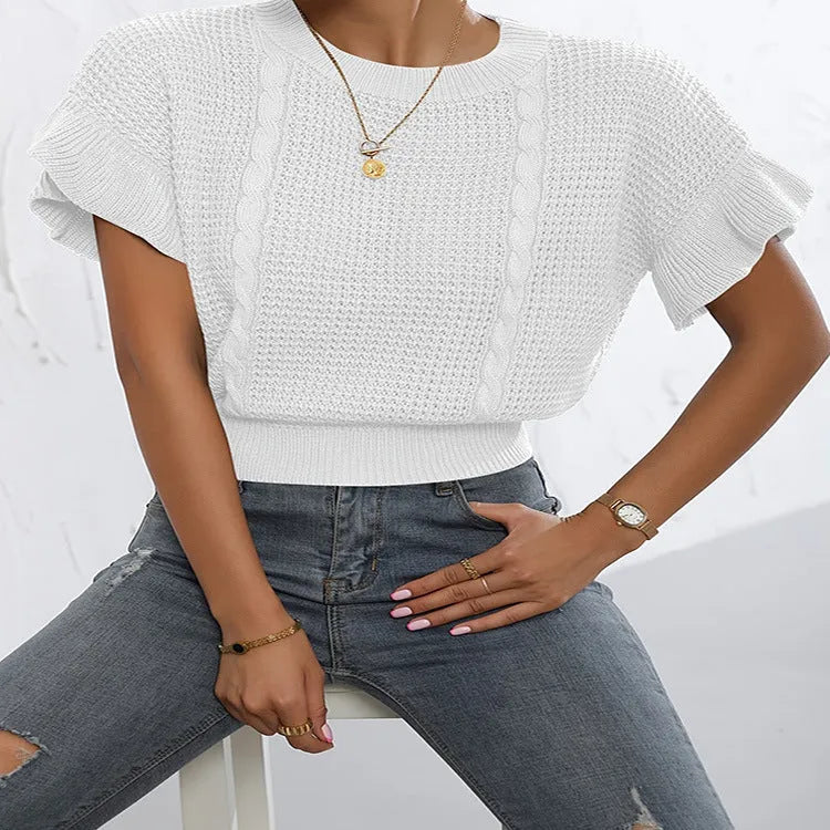 White knitted pullover sweater with ruffled short sleeves created from twisted string, shown in a loose fit.