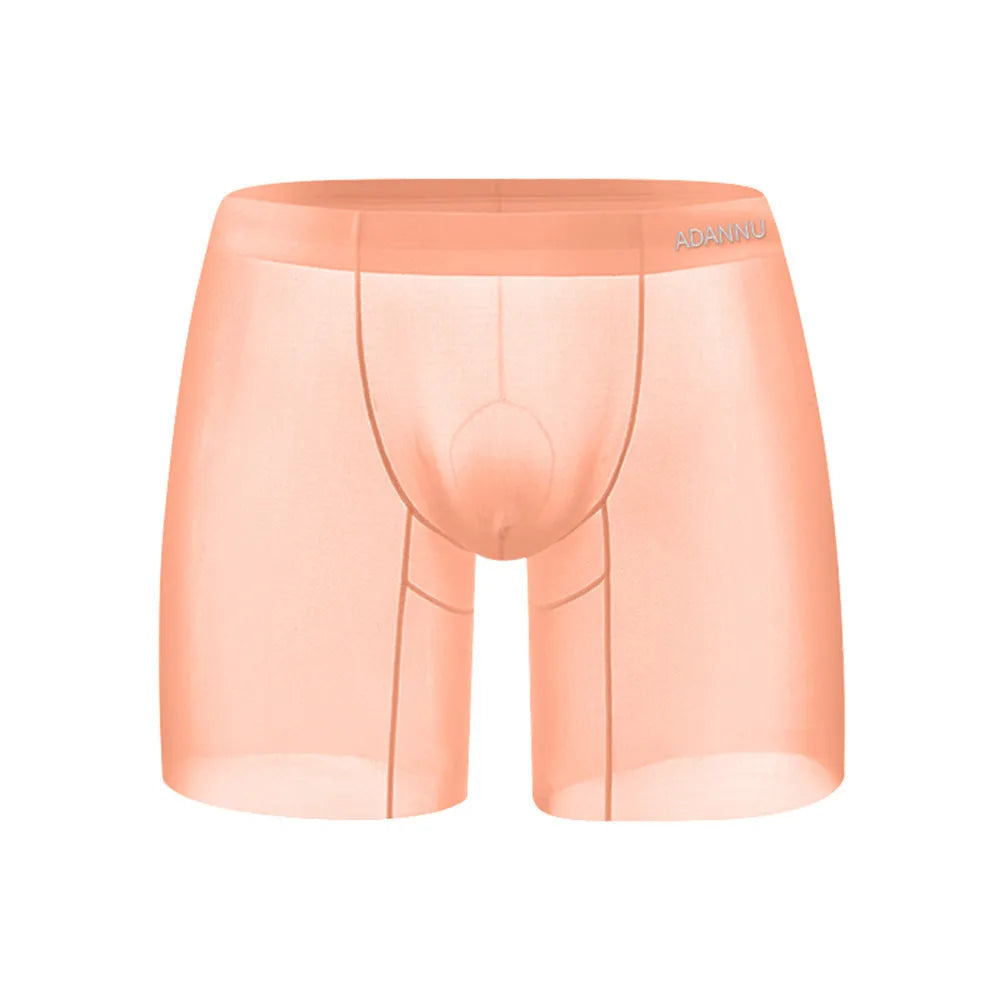 Men's orange seamless low-waist boxer shorts with quick-dry nylon fabric for exercise.