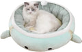 Green chick dinosaur shaped cat bed with straps that can be used flat or hung as a hammock