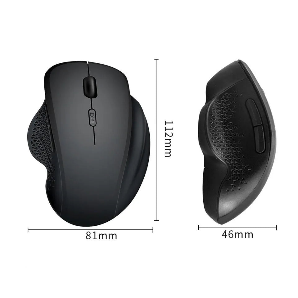 Black rechargeable wireless mouse with USB cable next to laptop showing compact 112mm size