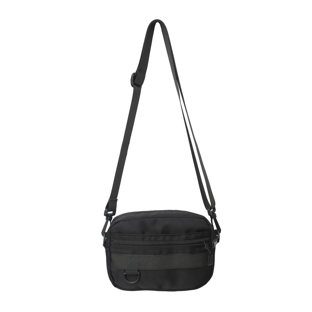 Men's black nylon crossbody messenger bag with sewing thread detail showing front view.