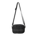 Men's black nylon crossbody messenger bag with sewing thread detail showing front view.