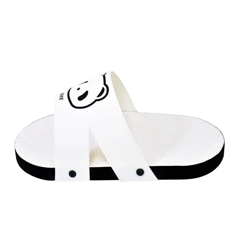 White slipper-style corrugated paper cat scratch board on floor