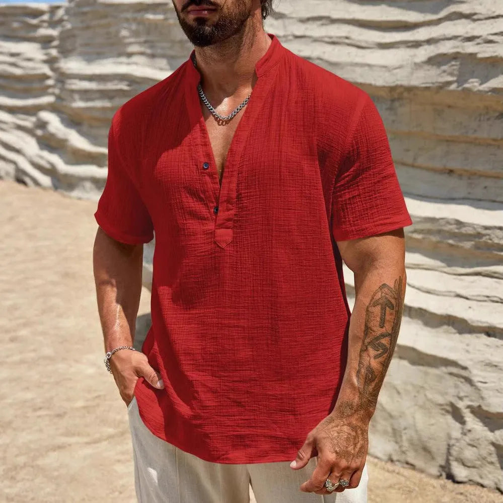 Men's solid colour short sleeve casual shirt with stand collar in a light blue shade.