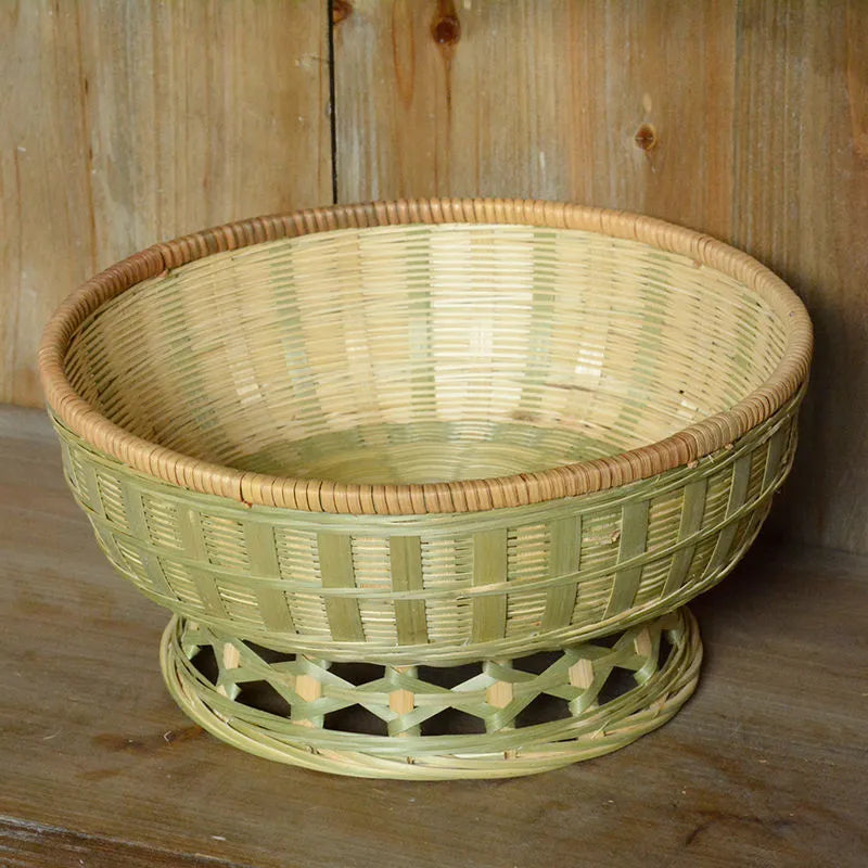 Handmade bamboo storage basket in woven construction showing three size options