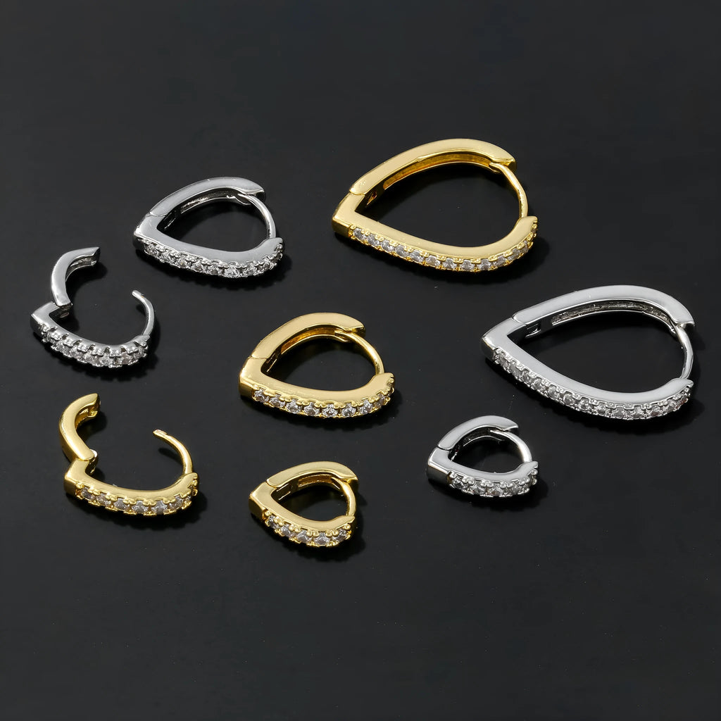 Gold geometric heart-shaped clip-on earring for women on a white background.