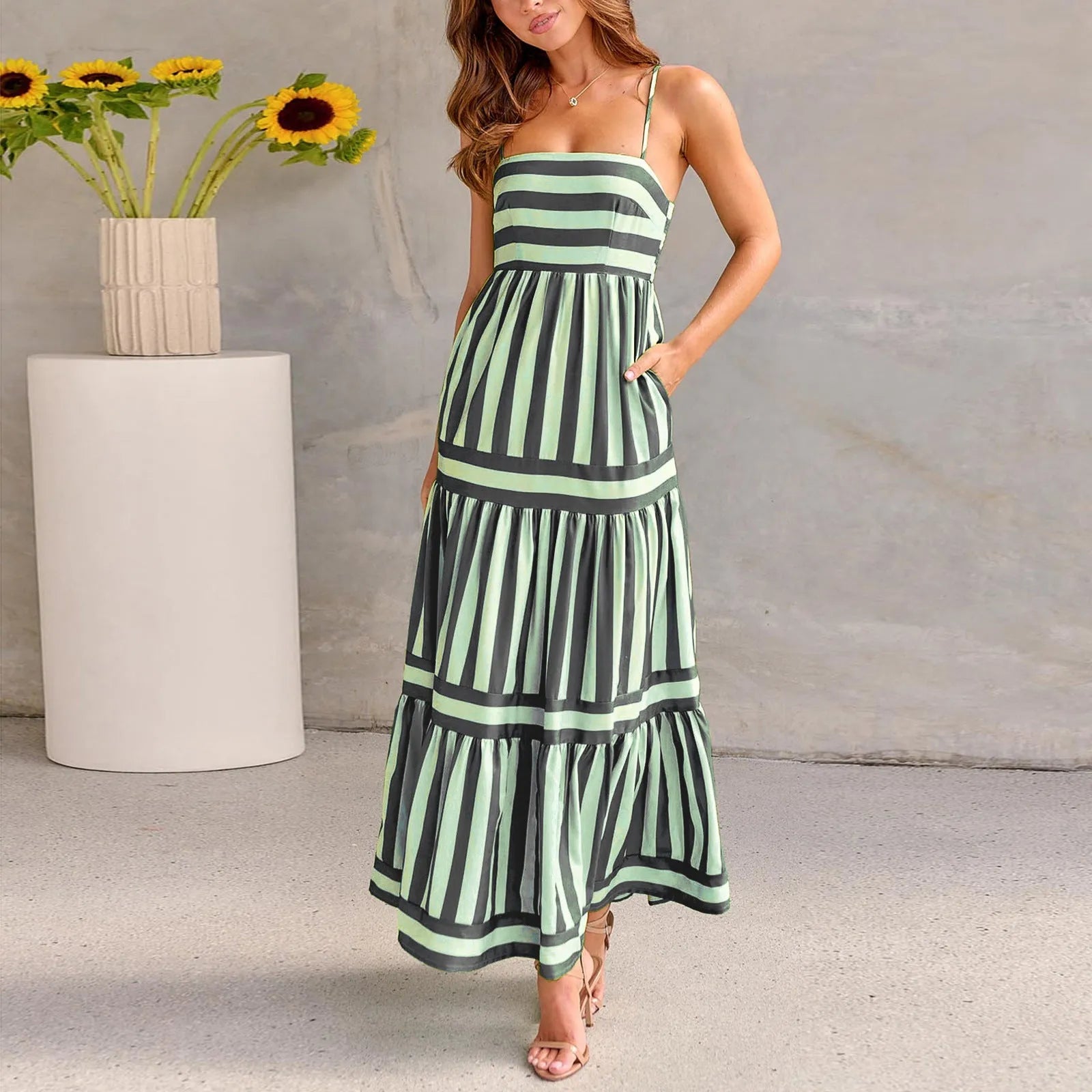 Women's striped printed summer dress with suspender straps and side pockets in blue colour