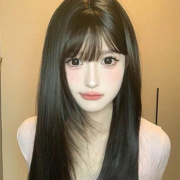 Dark brown long straight synthetic wig with bangs on wig head