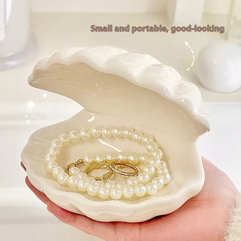 White porcelain storage tray with small night lamp in modern minimalist design