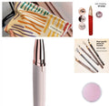 Eyebrow epilator pen with gold plated head and LED light on pink background