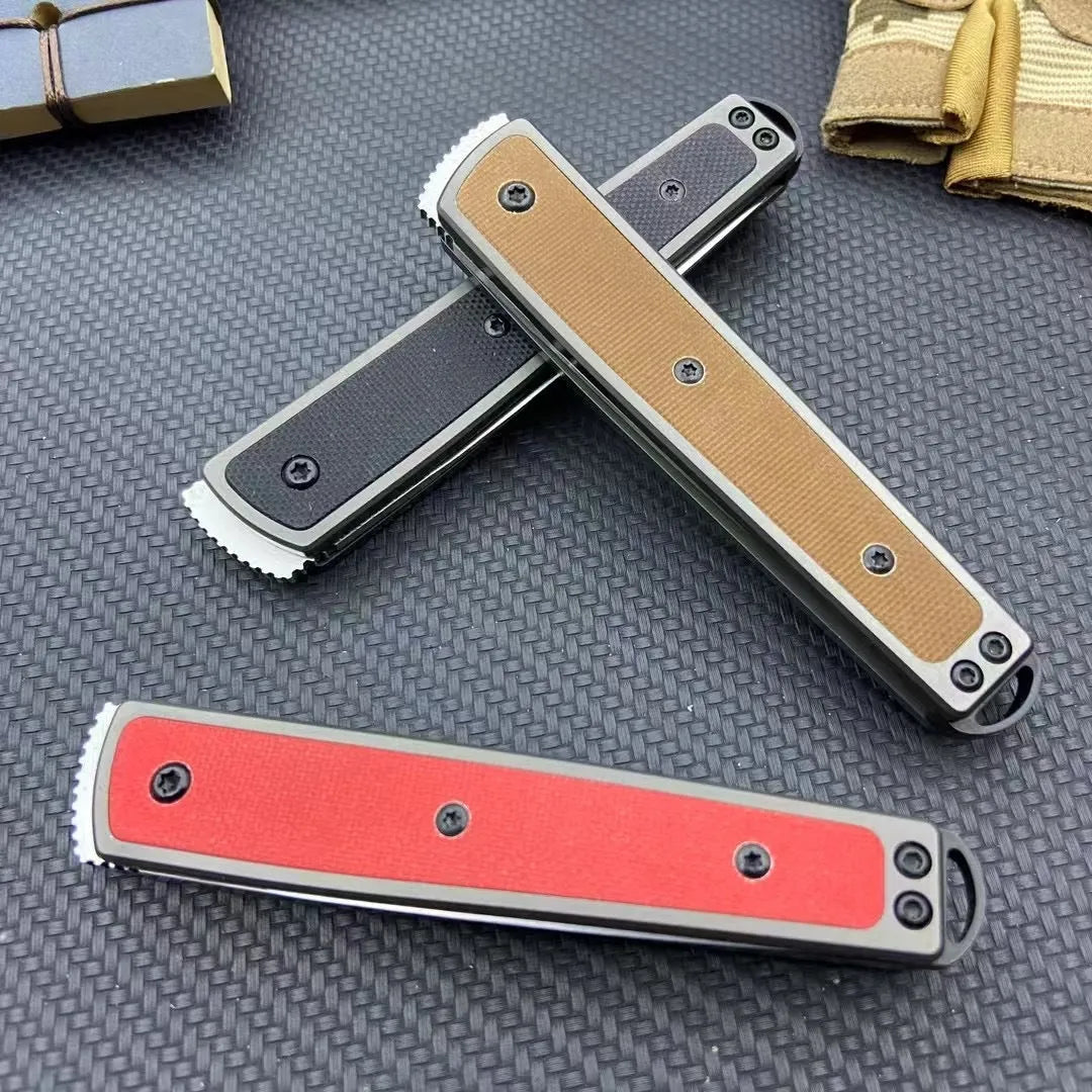 Folding fruit knife with stainless steel blade in black, brown, or red handle colours
