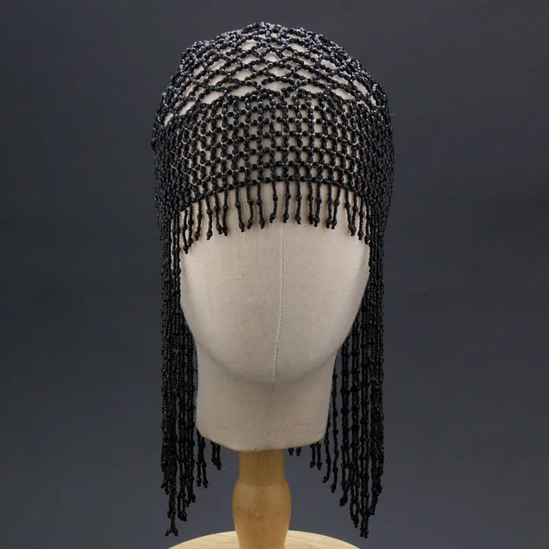 Handmade beaded belly dance hat with alloy construction and long tassels in black or silver