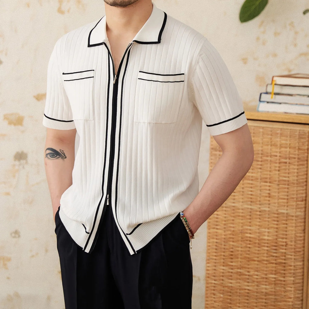 Men's slim-fit black lapel polo shirt with short sleeves made from elastic viscose blend knit fabric.
