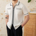 Men's slim-fit black lapel polo shirt with short sleeves made from elastic viscose blend knit fabric.