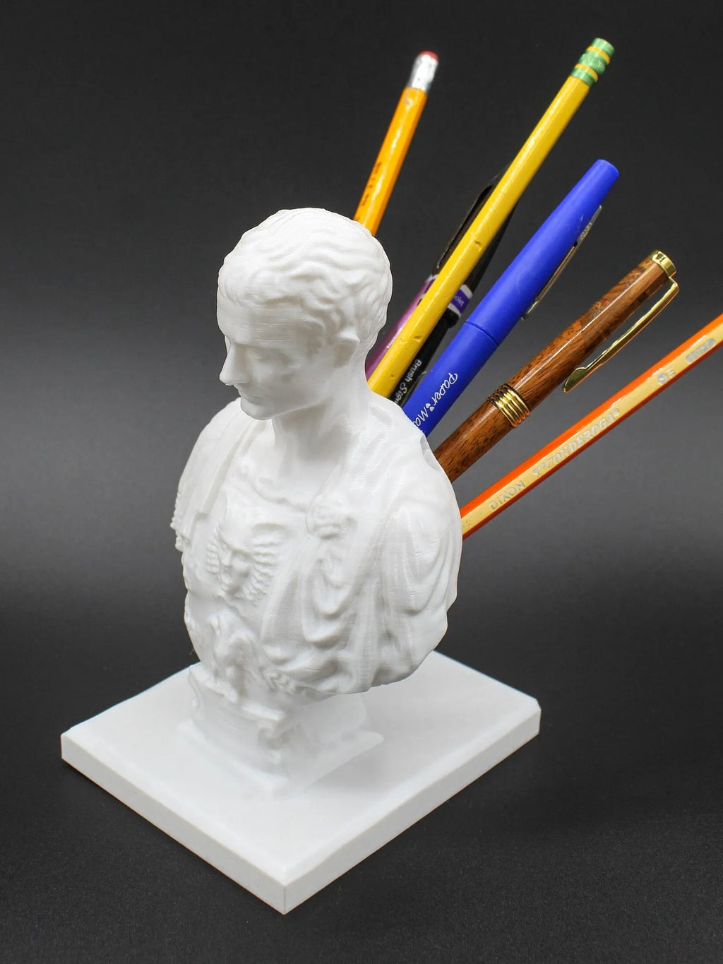 White American creative character modelling synthetic resin pen holder for desk organisation.