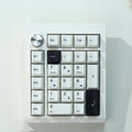 Wireless mechanical numeric keyboard in black or white colour with Bluetooth and 2.4GHz wireless connectivity