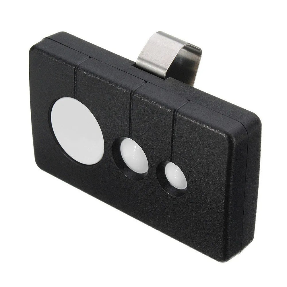 Black three-button garage door remote control on a white background.